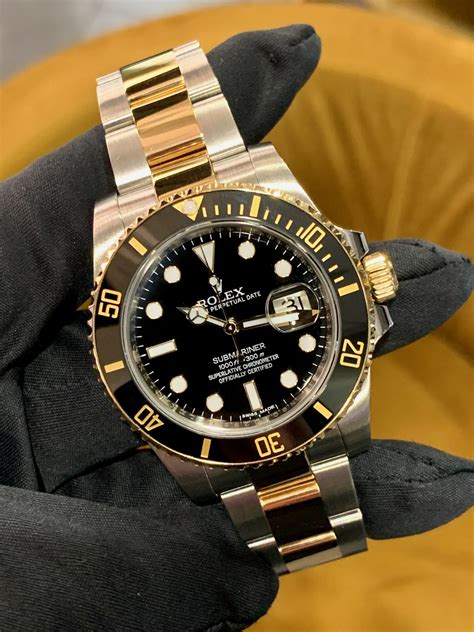 Rolex steel and gold submariner